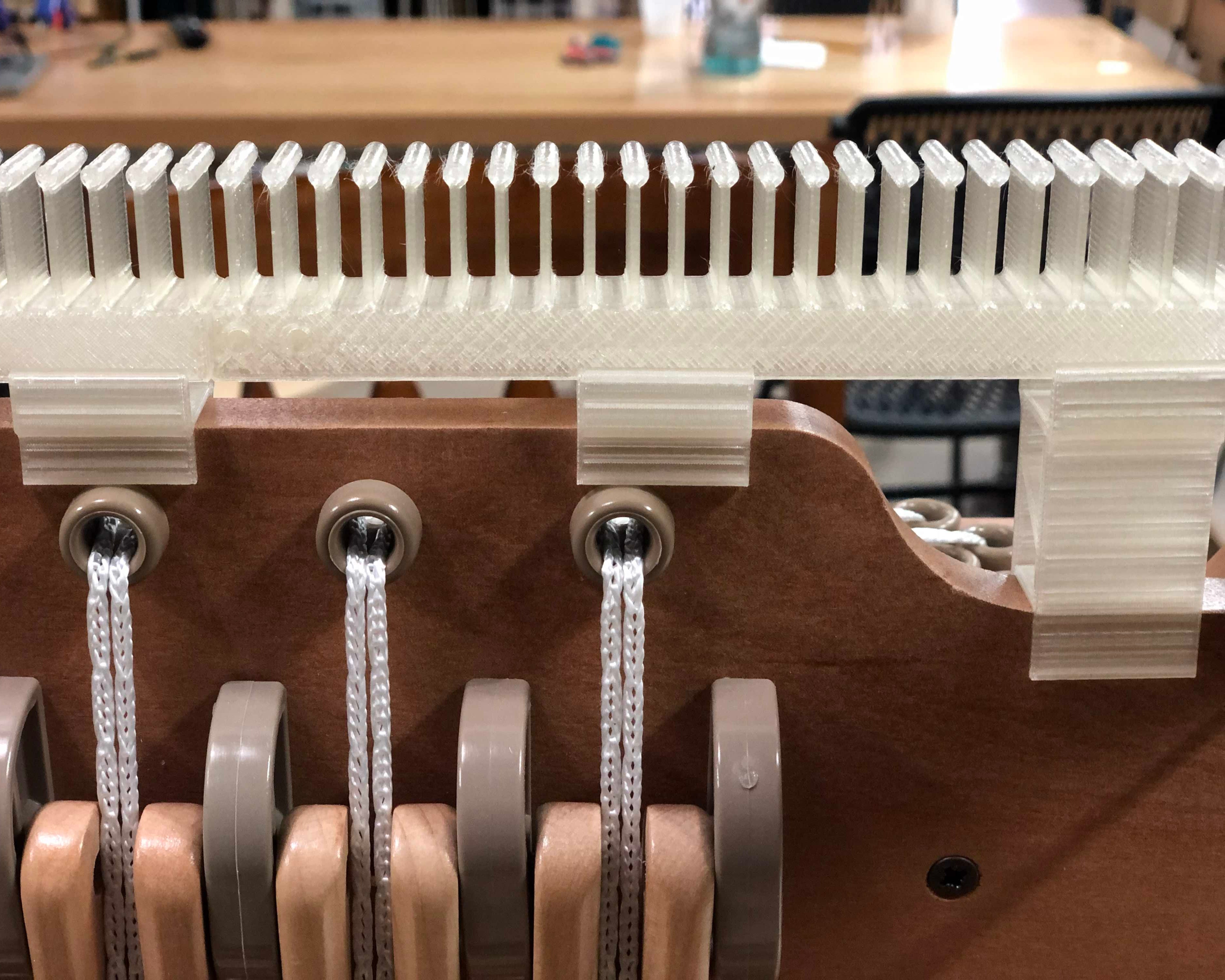 Shows clips for the LoftyFiber raddle - both Short and Tall - Handy Weaving Accessories