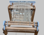 Raddle and Helping Hands on Ashford Brooklyn Table loom.  Helpful Weaving Accessory