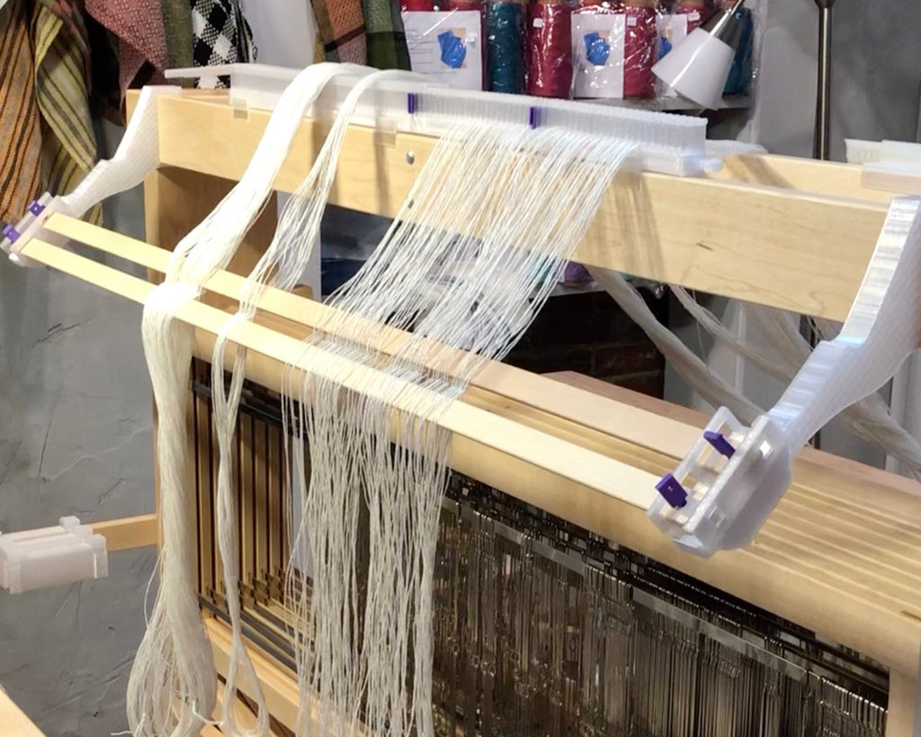 LoftyFiber Helpng Hands on a Schacht Standard weaving loom - Helpful Weaving Accessories