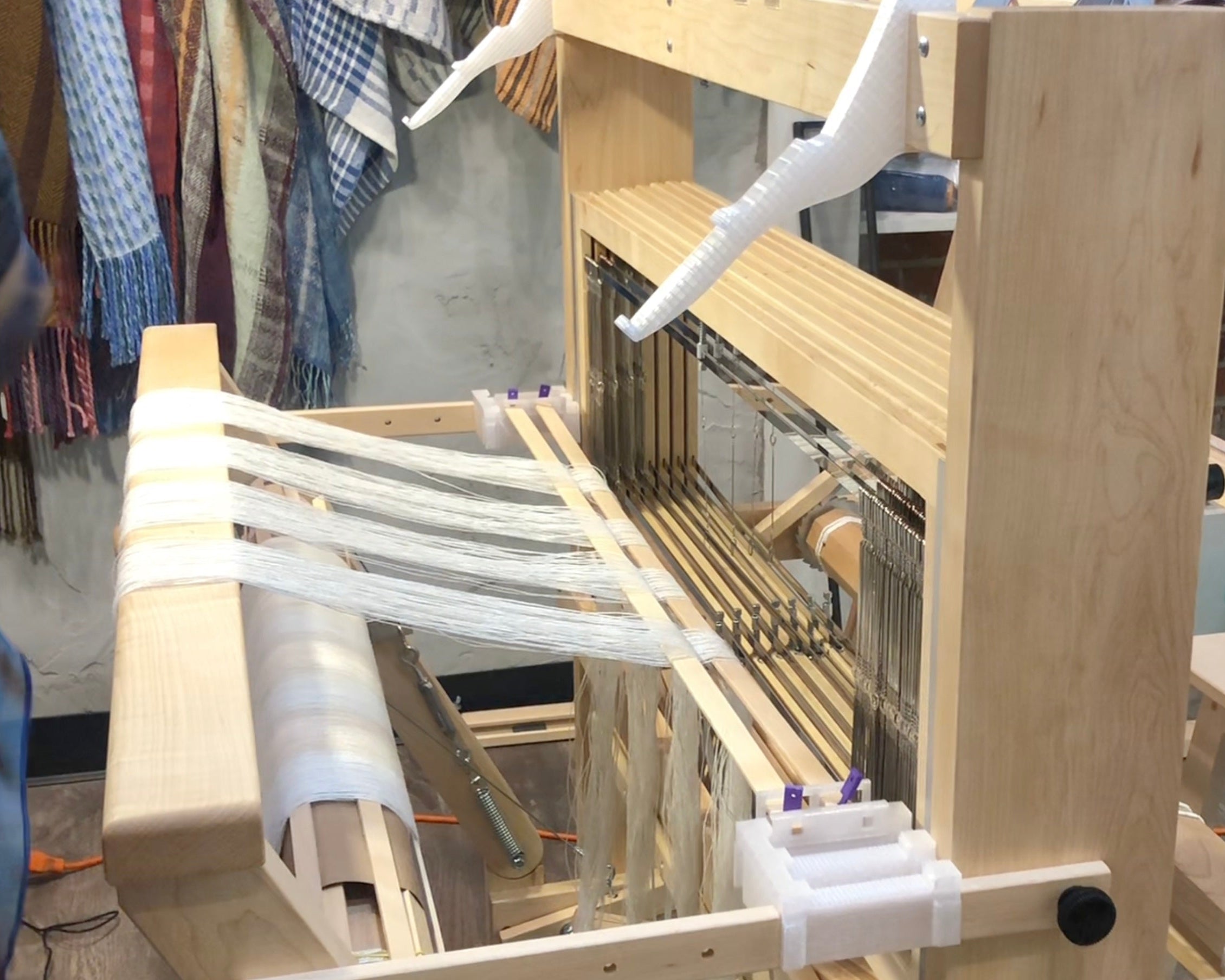 LoftyFiber Helpng Hands on a Schacht Standard weaving loom - Helpful Weaving Accessories